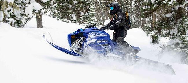Yamaha Snow Mobile, found at Markham Mower, going up a mountain